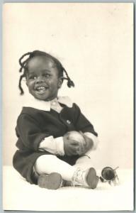 BLACK AMERICANA LAUGHING BABY GIRL ANTIQUE REAL PHOTO POSTCARD RPPC