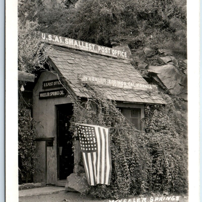 1939 Wheeler Springs CA RPPC Smallest Post Office Real Photo Flag Postcard A97