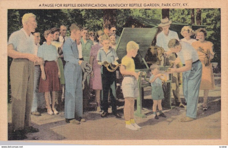 PARK CITY, Kentucky, 1930-1940's; Kentucky Reptile Garden, Boys Holding Snakes