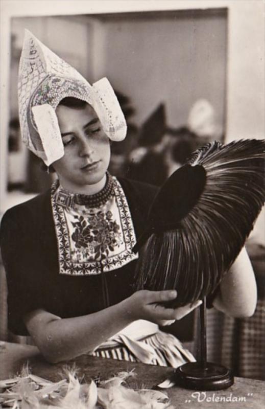 Netherlands Volendam de Gouwe Deken Workshop Girl Making Feather Hat Photo
