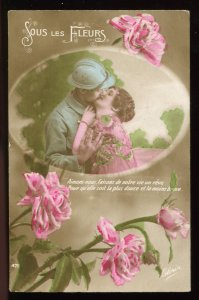 Sous les Fleurs. WWI real photo French postcard. Soldier kiss. 1918 message