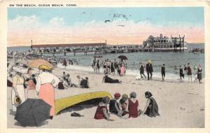 Ocean Beach Connecticut~Girls Playing in Sand by Canoe~Ship @ Pier~1925 Postcard