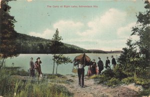 1908 The Canoe Carry on Eight Lake Adirondack Mts New York NY Postcard