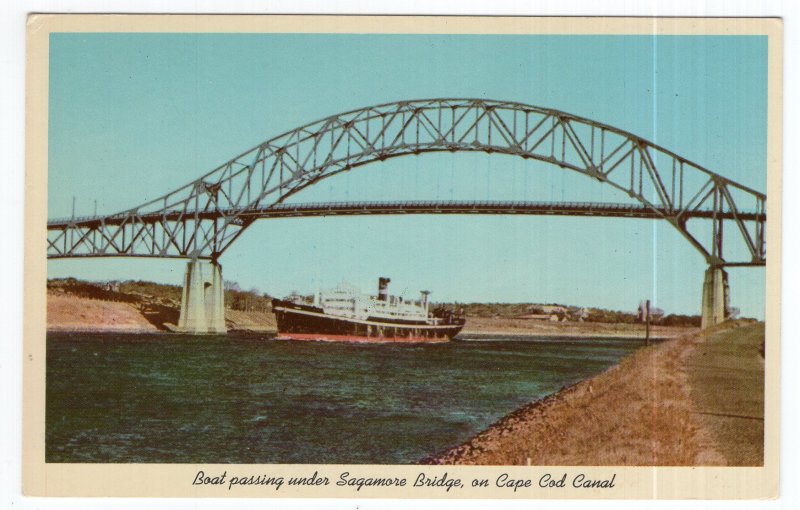 Boat passing under Sagamore Bridge on Cape Cod, Mass