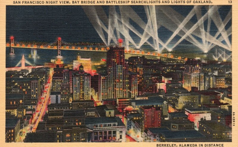 Vintage Postcard 1930's Night View Bay Bridge Battleship Searchlights Oakland CA