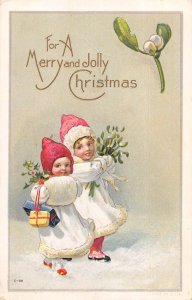 Christmas Greetings Children with Mistletoe Vintage Postcard AA41864