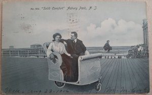 Postcard NJ Asbury Park - Solid Comfort - Couple in Rolling Chair