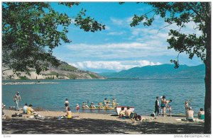 Swimming and sun-bathing, Okanagan Lake Beach at Penticton, British Columbia,...