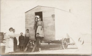 Outlook SK area Women & Children Home on Wheels c1912 RPPC Postcard G91 *as is