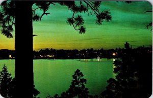 Coeur d' Alene, ID Idaho  EVENING GLOW OVER LAKE Night Lights  VINTAGE Postcard