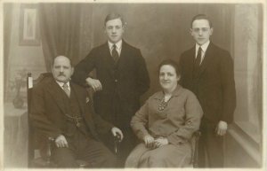 Postcard unknown Anonymous people family photo portrait necklace boys suits