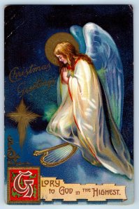 1910 Christmas Greetings Angel Praying Lyre Embossed Goshen NY Antique Postcard