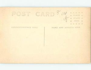 Pre-1918 rppc patriotic LARGE USA FLAG HANGING BEHIND GRANDMA ON CHAIR HM0129