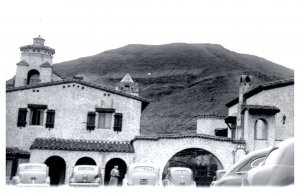 Scottys Castle Death Valley 1941 w Old Cars RPPC Postcard Repro