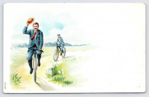 Two Men Riding Bicycle c1910 Postcard