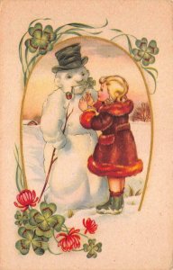 CHRISTMAS HOLIDAY GIRL SNOWMAN TOBACCO PIPE POSTCARD (c. 1910)