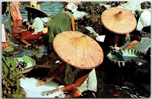 VINTAGE POSTCARD PHILLIPINE WOMEN ATTENDING TO THE LAUNDRY CHORES IN A CREEK