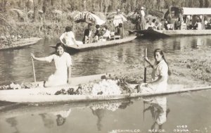 Xochimilco. Mexico OSUNA #1143. Women in boats with produce.