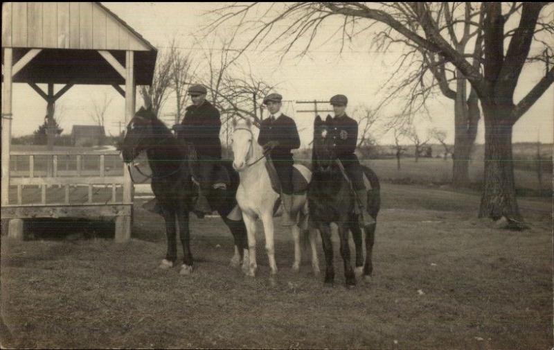 Young Men Wearing Newsboy Hats on Horses c1910 Real Photo Postcard