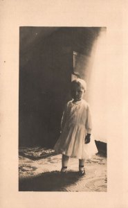 Vintage Postcard Photo Of A Little Girl Wearing A White Dress