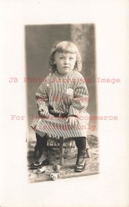 Unknown Location, RPPC, Lewis Thompson Sitting on a Chair, Photo