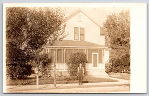 Man in Front of Home w/ White Siding Porch Street View Real Photo RPPC Postcard