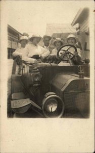 Women & Man in Early Car Visible Hood Ornament Brand? Real Photo Postcard