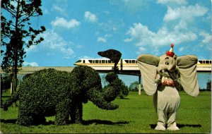 Vtg Florida FL Walt Disney World Strolling Topiary Lane Dumbo Monorail Postcard