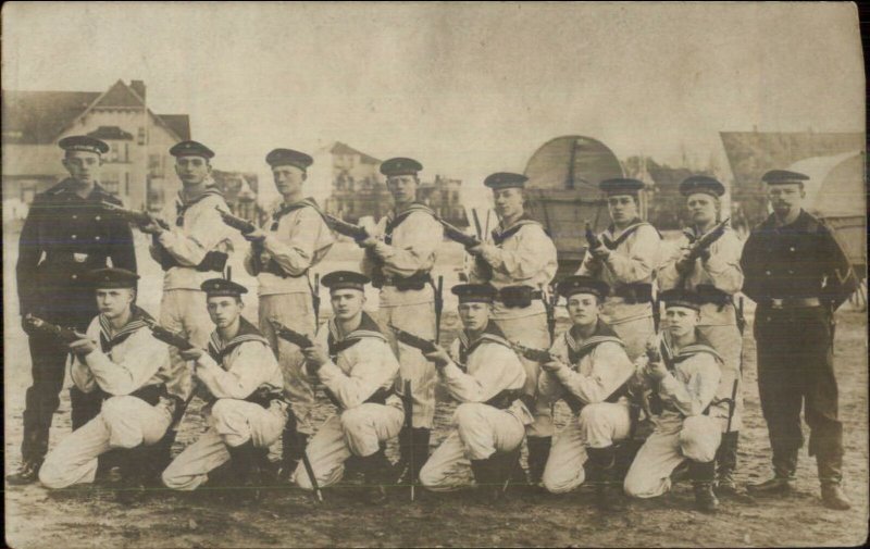 German Navy Sailors Pose Uniforms Guns Cuxhaven Germany Real Photo Postcard