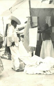 RPPC Postcard 290. Man & Woman w/ White Fabric, Market at Taxco Mexico Unposted