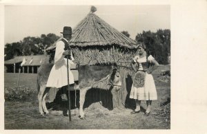 Folk costumes Hungary shepherd riding donkey 1936