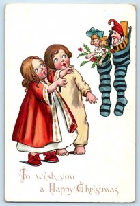c1910's Christmas Children Stocking With Toys Doll Berries Embossed Postcard