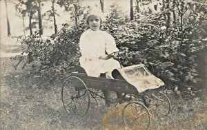 YOUNG GIRL RIDING STYLISH PEDAL CAR-1910s REAL PHOTO POSTCARD