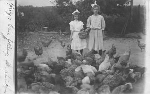 H94/ Hamilton Ohio RPPC Postcard c1910 Girl Farmers Chickens Feed 94