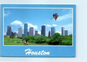 A colorful balloon adds special beauty to Houston's superb skyline - Houston, TX