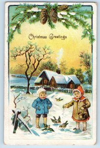 c1910's Christmas Greetings Children Feeding Birds Embossed Antique Postcard