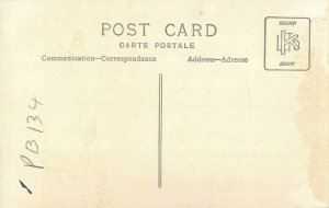 African warrior pulling tourist cart c1940 RPPC aj 228