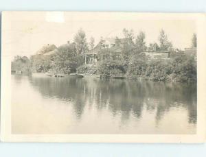 1947 rppc HOUSE ON LAKE WITH STEPS TO BOAT DOCK Postmarked Middleburg NY HM2370