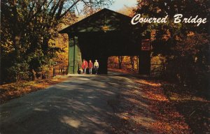 Walking Dog at Covered Bridge 101st Street, Troy NY, New York