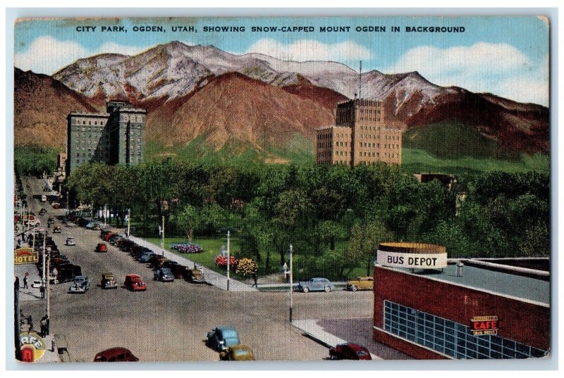 City Park Ogden Utah Showing Snow Capped Mount Ogden Bus Depot Cars Postcard