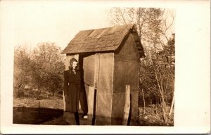 Real Photo Postcard Cute Woman Outside Small Wood Hut Building~1784