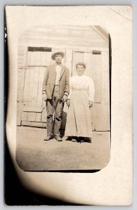 RPPC Old Farmer And His Wife At The Barn Real Photo Postcard W27