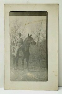 RPPC Woman on Horse Large Helmet or Head Gear Hat Postcard D20