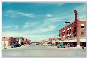 c1960's View Of Oak Street Coffee Shop Hotel Brandon Cars Pecos TX Postcard