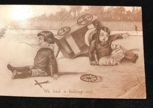 Circa 1910's We've had a Falling Out Comic Postcard Soap Box Car