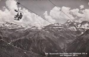 Switzerland Braunwald Sesselbahn mit Kaerpfstock und Hausstock Photo