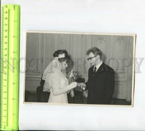 467379 USSR 1960-years wedding ring exchange photo