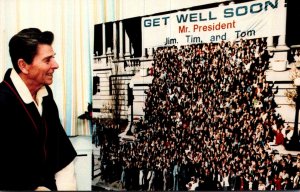 President Reagan Accepting Get Well Card From White House Staff 8 April 1981