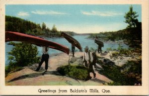 Postcard QC Greetings from Baldwin's Mills Men Carrying Canoes 1930s K13