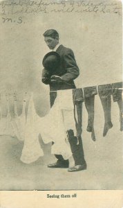 Man Looking at Woman's Underwear, Nylons on Clothesline Litho B&W Postcard